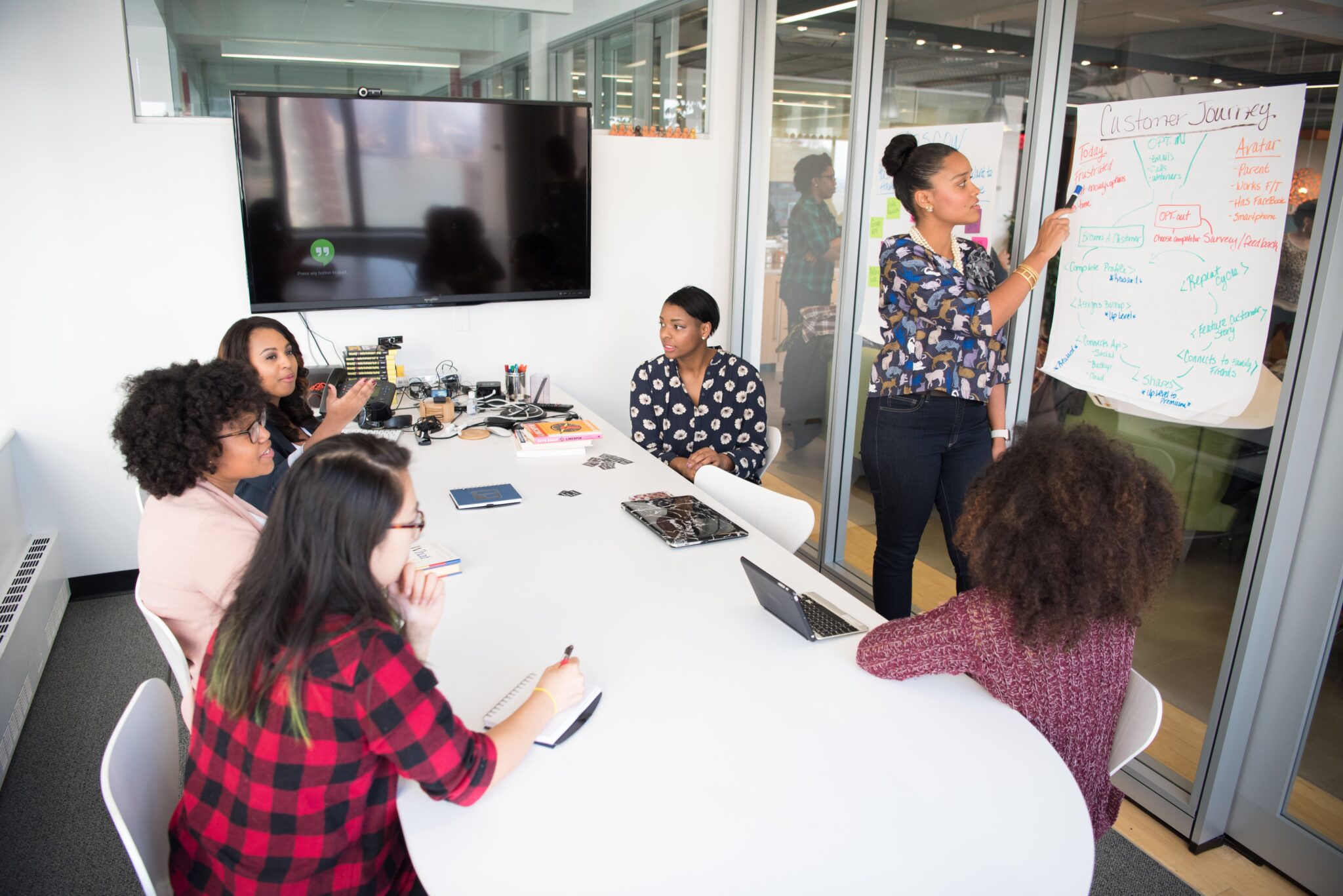 employees having a meeting in an office