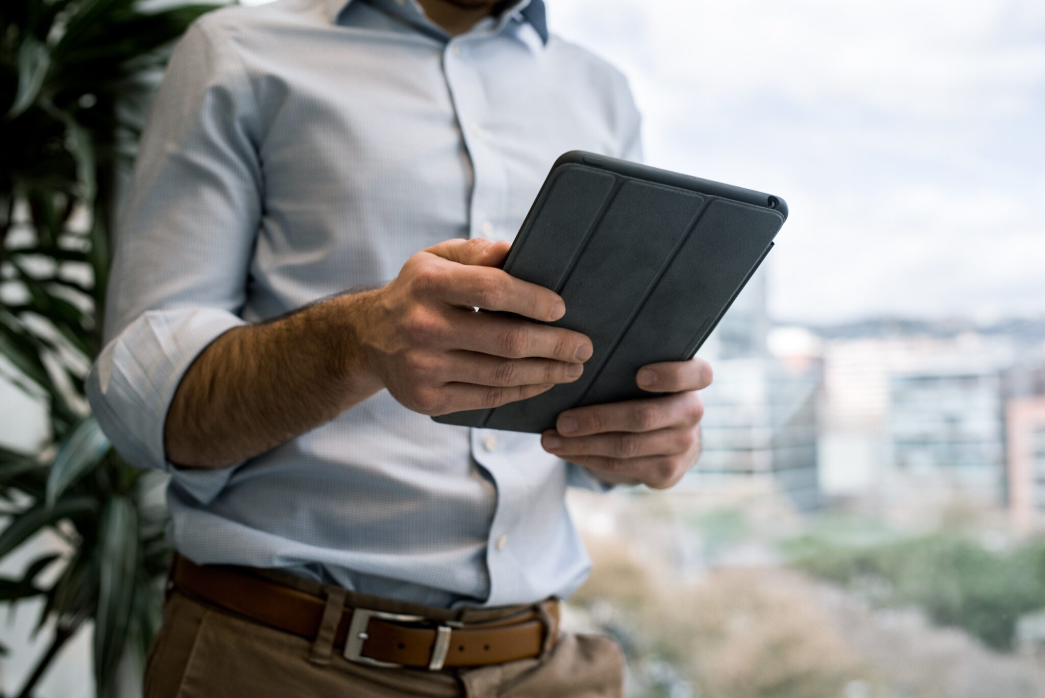 man holding a digital tablet