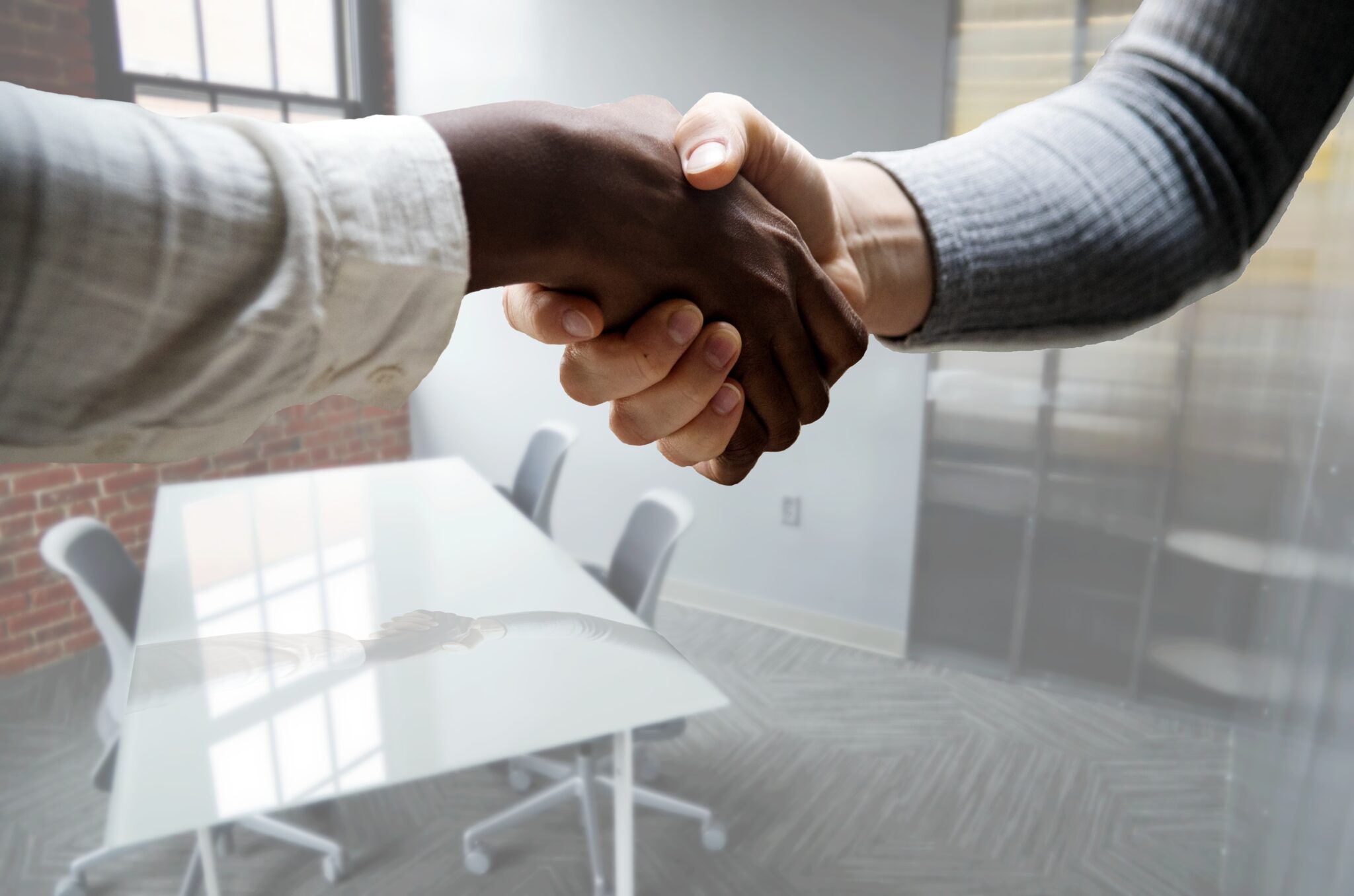 two people shaking hands