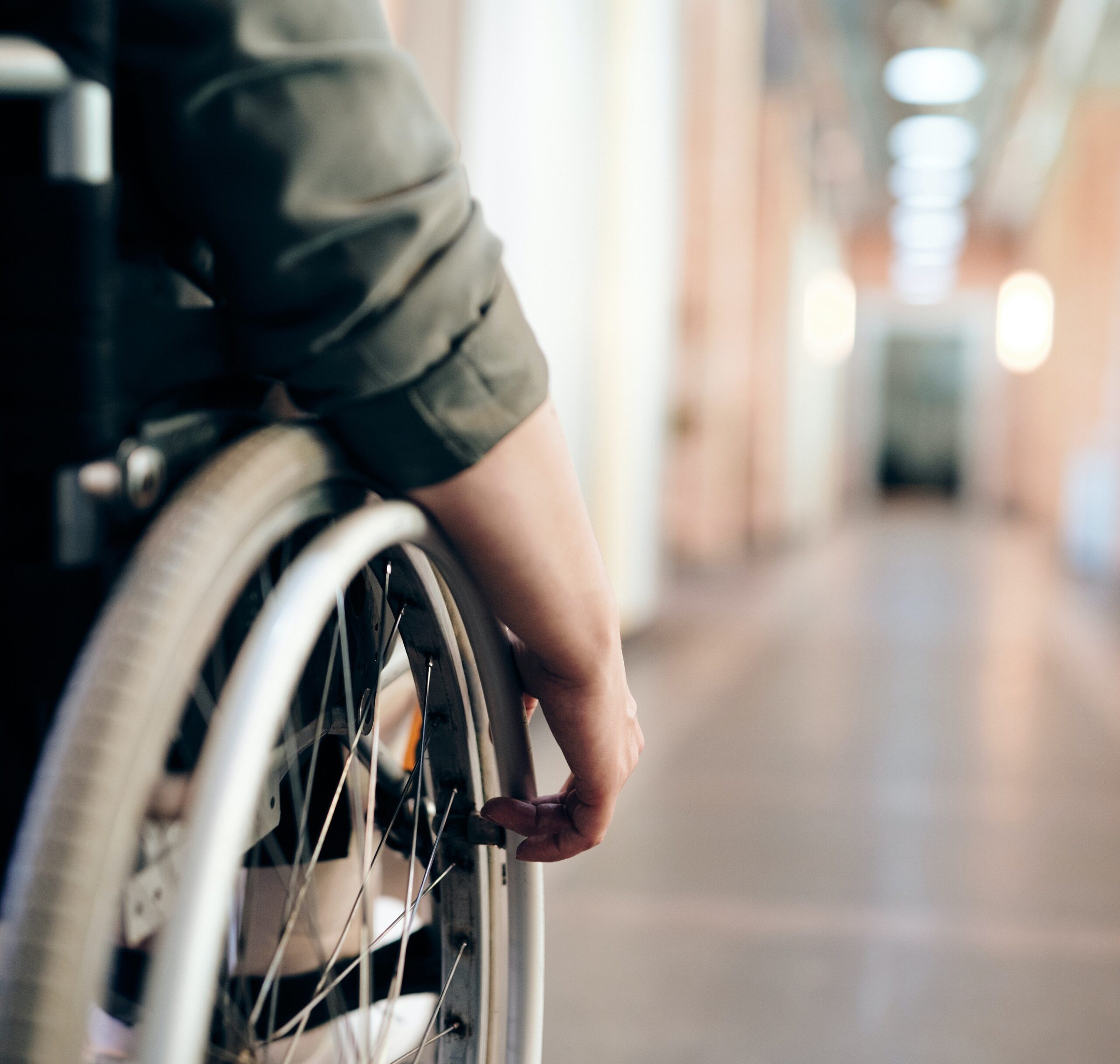 person moving in wheelchair